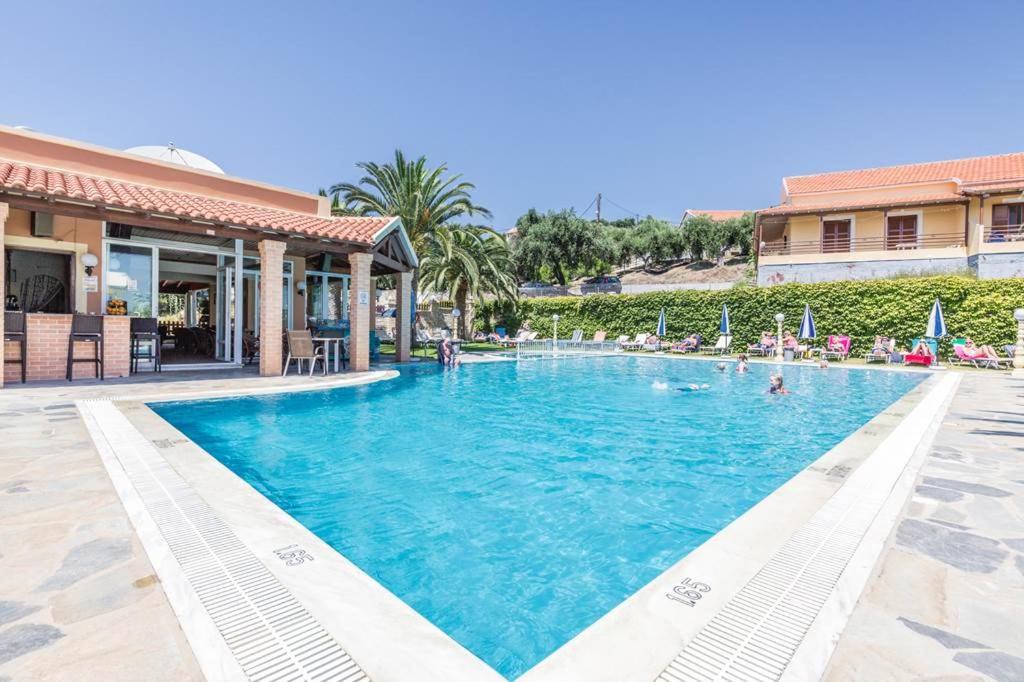 Kapetanios Apartments Агиос Стефанос Экстерьер фото