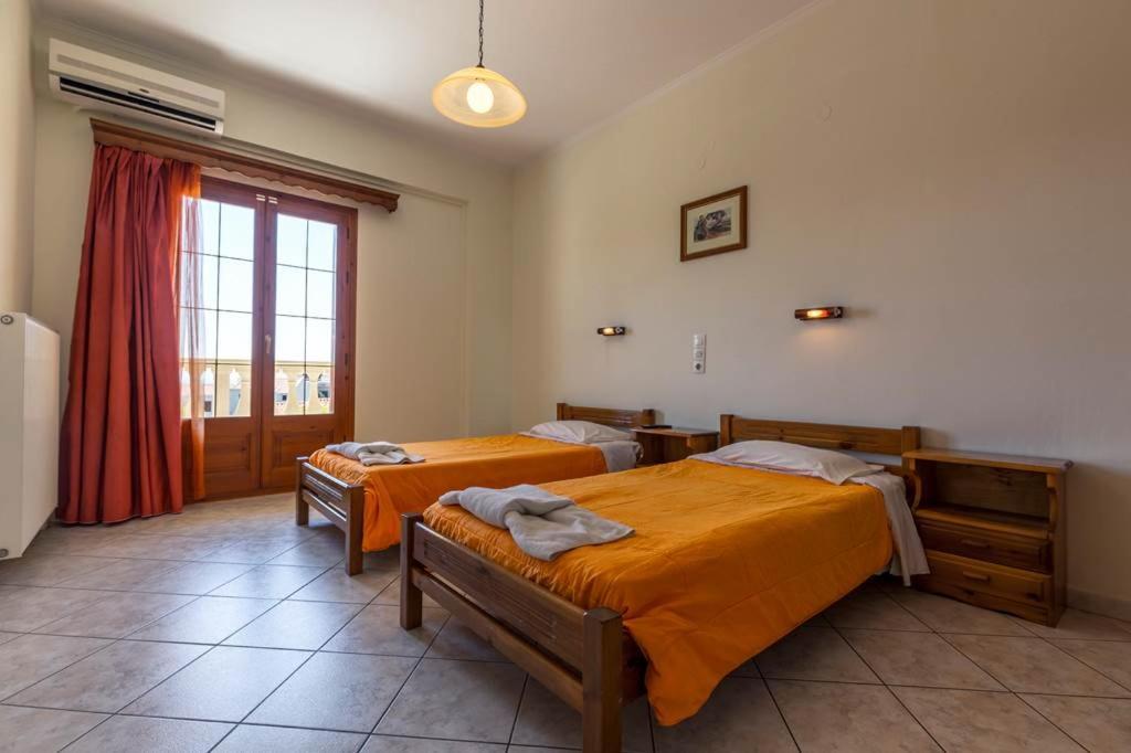 Kapetanios Apartments Агиос Стефанос Экстерьер фото