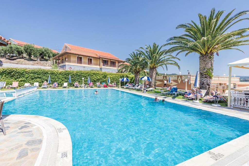 Kapetanios Apartments Агиос Стефанос Экстерьер фото